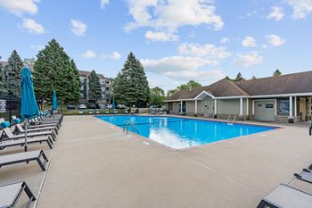 Sparkling outdoor pool with sundeck